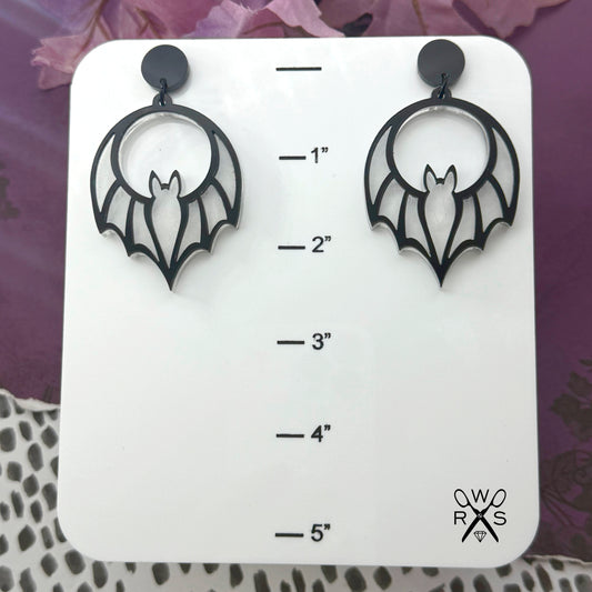 Batty Babe Dangles in White Web and Black