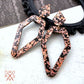 Deadly Dangles in Rose Gold Foil
