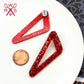 On Point Statement Studs in Red Glitter