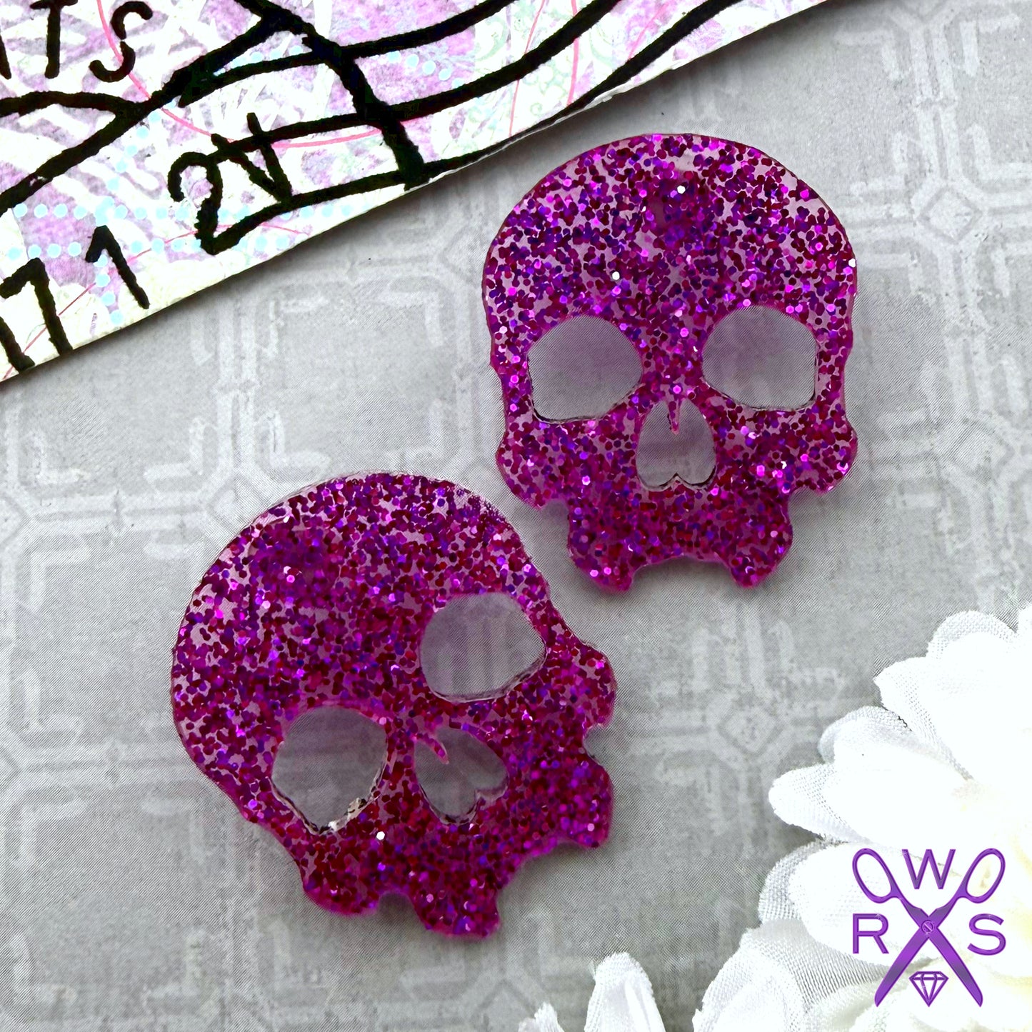 Skull Crush Statement Studs in Purple Glitter
