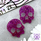 Skull Crush Statement Studs in Purple Glitter